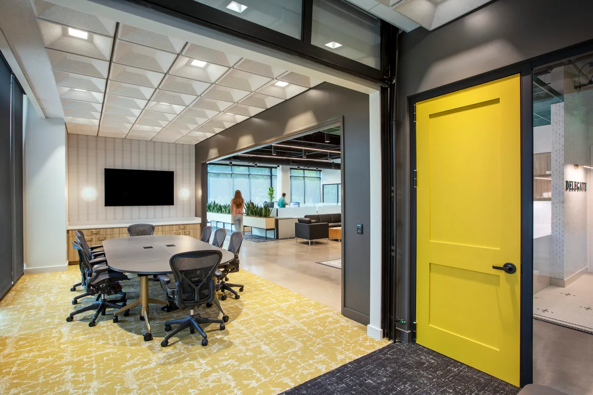 Open office with glass-walled conference rooms